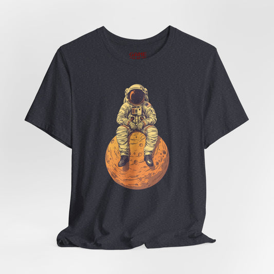 Astronaut Sitting on Planet T-Shirt, Space Explorer Graphic Tee