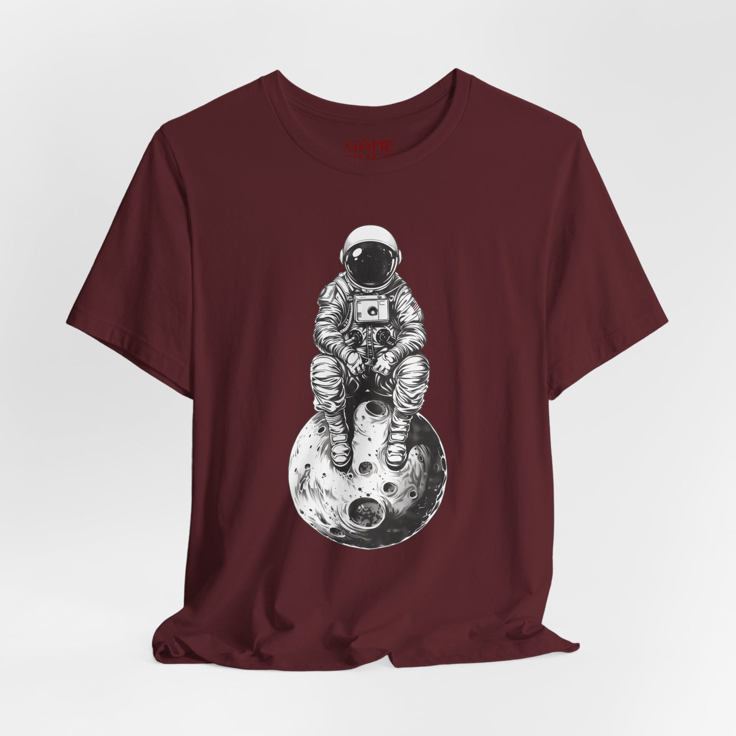 Astronaut Sitting on Textured Planet Shirt #3 - Minimalist Black and White Space Suit Design